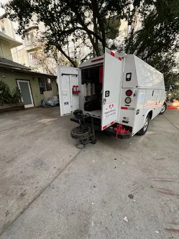 Magnet Plumbing service vehicle on-site for Water Heater Repair in The Oaks